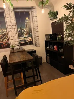 a dining room with a table and a window at The Studio no windows 20 minutes by bus to downtown Amsterdam in Purmerend