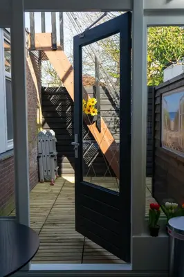 a front door with a view of a staircase at B&B Sunflower Leiden in Leiden