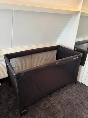 a large black shelf in the corner of a room at Stillwater Lodge De Rijd in Nieuwe-Niedorp