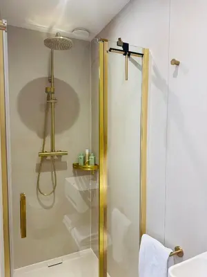 a bathroom with a shower with a glass door at Casa Camino Del Mar 40 in Noordwijk aan Zee