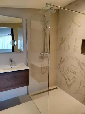 a bathroom with a shower and a sink at Blom studio's in Hillegom