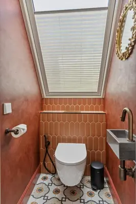 a bathroom with a toilet and a sink at STONEBRIDGE boutique apartments - City centre in Alkmaar