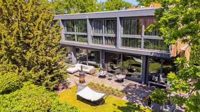 an aerial view of a house with a patio at Villa Red Cedar in Bergen