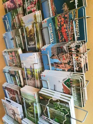 a pile of books stacked on top of each other at B&B Evergreen in Wijdewormer