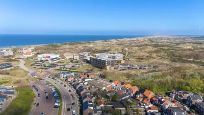 an aerial view of a town near the ocean at Le Paysan in Wijk aan Zee