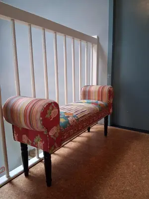 a chair sitting in front of a window at House nearby Amsterdam in Almere