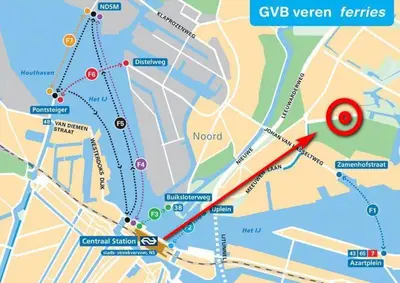 a map with a red line on it at Loft with parkside view in Amsterdam