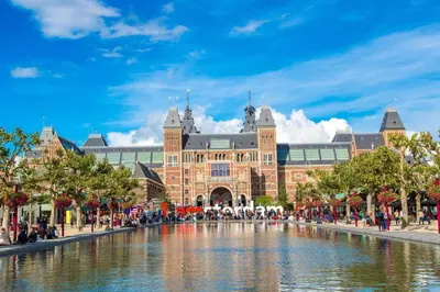 a building with a water fountain in front of it at The IF Boutique hotel in Amsterdam