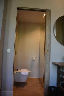 a bathroom with a bath tub and a sink at The IF Boutique hotel in Amsterdam