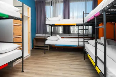 a dorm room with bunk beds in it at Amsterdam Teleport Hotel - Free Parking in Amsterdam
