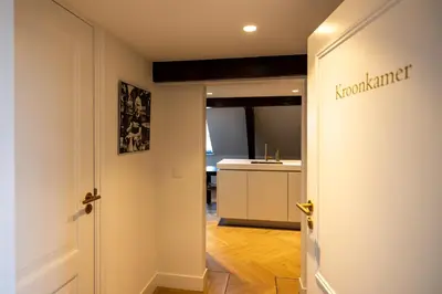 an open door of a room with a kitchen at De Kroonkamer in Loenen aan de Vecht
