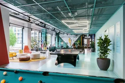 a billiard room with a pool table in the middle at The Social Hub Amsterdam West Extended Stay in Amsterdam