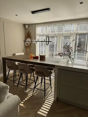 a kitchen with a large dining table and chairs at Luxurious, spacious appartment in Amsterdam