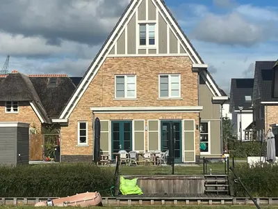 a large house with at House with garden in Amsterdam in Weesp