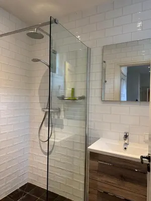 a bathroom with a shower and a sink at Barbera Guesthouse Hotel Apartments - Experience local life in the Old Centre in Haarlem