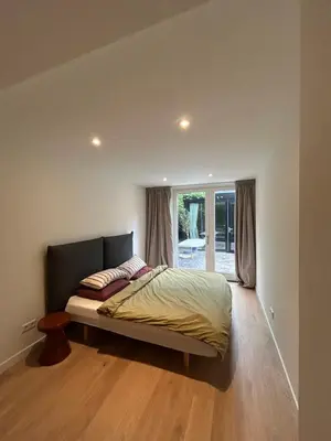 a bedroom with a bed in a room at Spacious and lovely home in Amsterdam