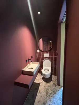 a bathroom with a sink and a toilet at Spacious and lovely home in Amsterdam