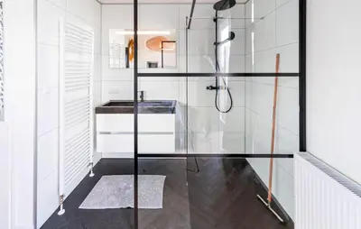 a bathroom with a shower with a glass door at Gorgeous Home In Vinkeveen With Sauna in Vinkeveen