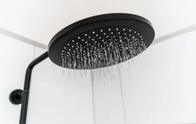a black shower head hanging from a ceiling at Gorgeous Home In Vinkeveen With Sauna in Vinkeveen