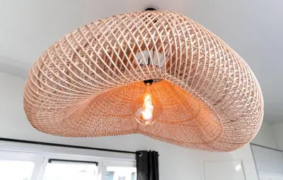 a large light fixture hanging from a ceiling at Beautiful Home In Vinkeveen With Sauna in Vinkeveen