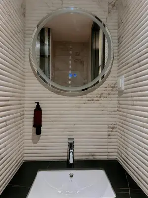 a bathroom with a sink and a mirror at Nebula Hotel by Ine's in Assendelft