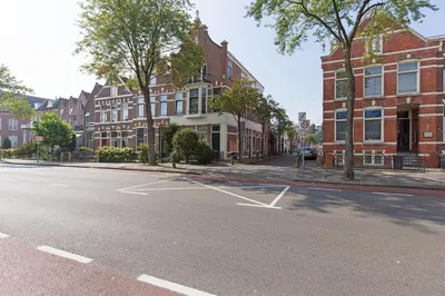 an empty street in a town with brick buildings at Authentic townhouse Alkmaar in Alkmaar