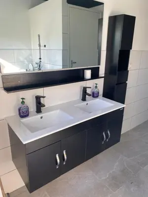 a bathroom with a white sink and a mirror at Luxe Glamping tent met sterrenhemel in Rijsenhout