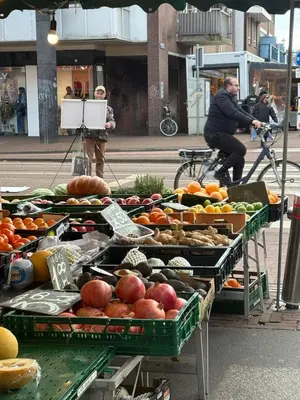 a display of fruits and vegetables on a street at Bellamy Suites in Amsterdam