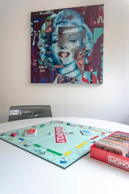 a table with a board game on top of it at Amsterdam-Houseboat-Amstel in Amsterdam