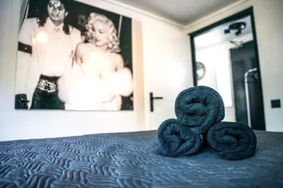a pair of snakes sitting on top of a bed at Amsterdam-Houseboat-Amstel in Amsterdam