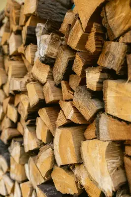 a pile of chopped wood is shown at Nice bright studio near the forest and Amsterdam in Baarn