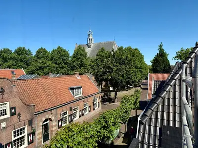 an overhead view of a city with buildings and trees at Vakantiewoning Casa Bergen Home in Bergen