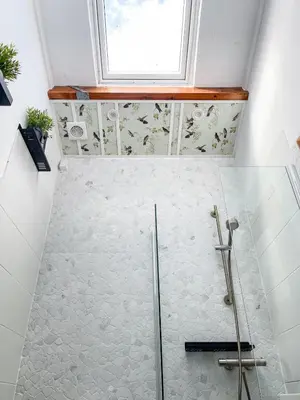 a bathroom with a shower and a window at The Kingfisher near beach and dunes Hargen and Schoorl in Dirkshorn