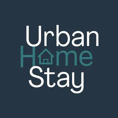 a sign that saysurbanine stay in white and green at ApartHotel De Koning by Urban Home Stay in Alkmaar