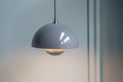a black light hanging from a ceiling at Suite Palette in Amsterdam
