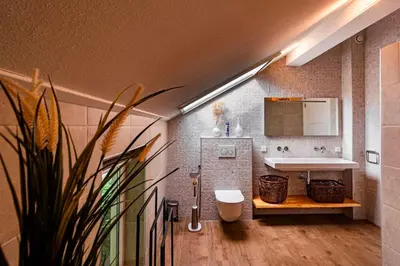 a bathroom with a sink and a toilet at Watervilla van Francke by Droomvilla in Ons Belang