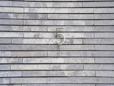 a brick wall with a hook on it at Holiday Home in Oud Ade near Kaag Lakes in Oud-Ade