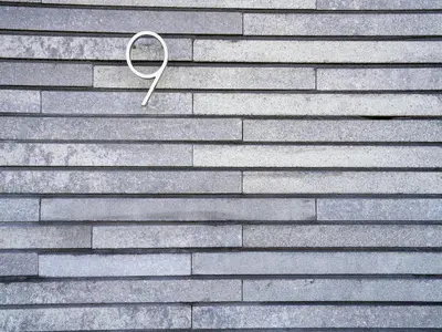 a magnifying glass on a brick wall at Holiday Home in Oud Ade near Kaag Lakes in Oud-Ade