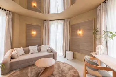 a living room with a couch and a table at Unique 3 floor apartment with AC at Westerpark in Amsterdam