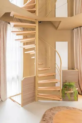 a room with a loft bed with wooden stairs at Unique 3 floor apartment with AC at Westerpark in Amsterdam