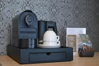 a black box with a camera on a table at Herberg Welgelegen in Katwijk