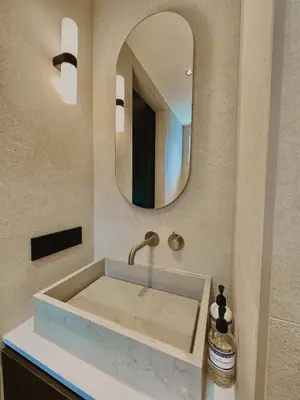 a bathroom with a sink and a mirror at Rembrandt & Vermeer in Amsterdam
