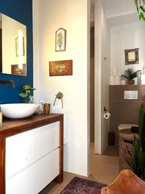 a bathroom with a sink and a toilet at Canal House with a Unique View in Amsterdam