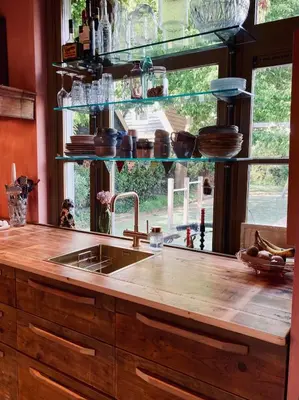 a kitchen counter with a sink and a window at Cosy real Dutch family house anno 1910 in Alkmaar