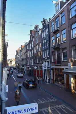 a view of a city street with buildings and cars at NEW cosy apartment in 9 streets in Amsterdam