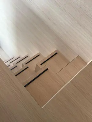 a wooden floor with three arrows on it at Modern Stay Tiny Houseboat to visit Amsterdam in Monnickendam