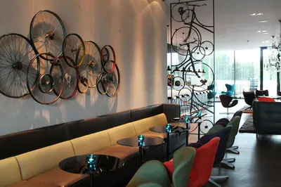 a restaurant with bikes hanging on the wall at Motel One Amsterdam in Amsterdam