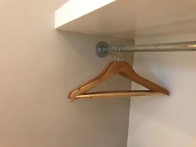 a wooden hanger in a room with a ceiling at Rust B&B in Amsterdam
