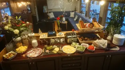 a table full of food on top of a counter at Botel Clair d'Etoile in Amsterdam