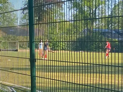 a group of people standing in a batting cage at Authentic villa near Amsterdam and nature in Ons Belang